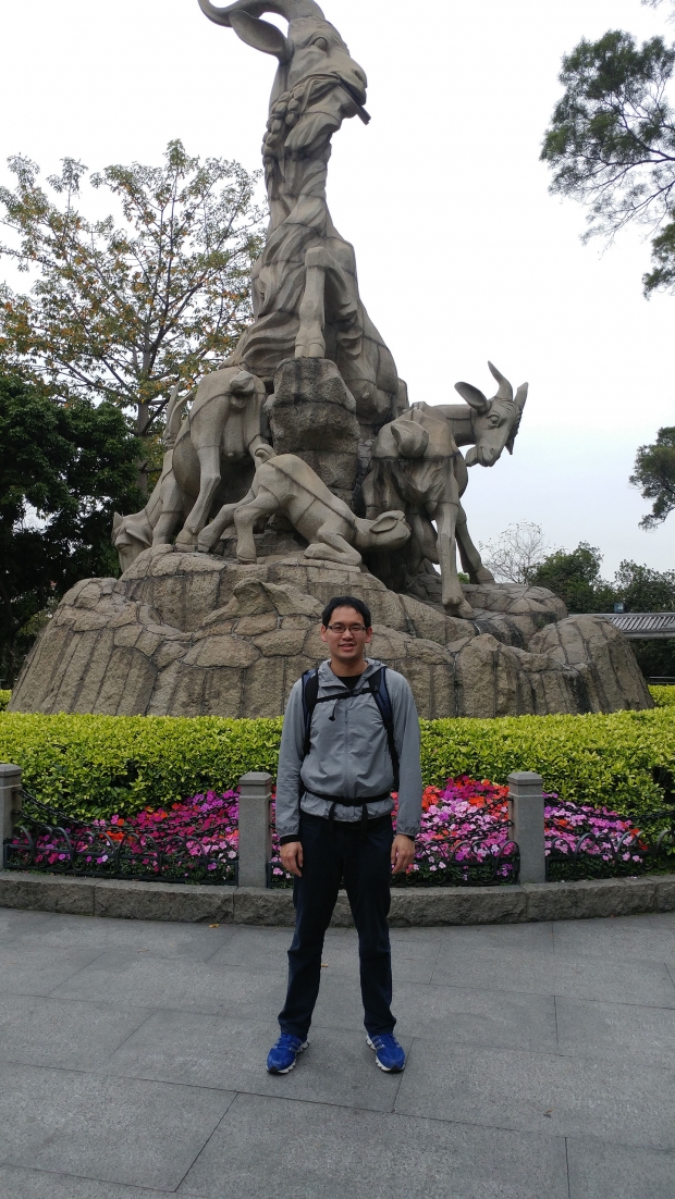 Tony in front of Five Rams Statue