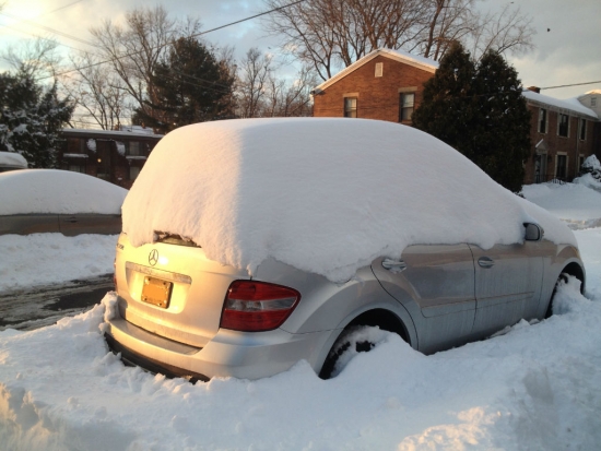 Car buried by snow 2014