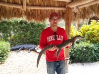 Tony holding a gator