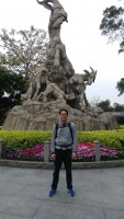 Tony in front of Five Rams Statue