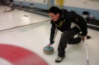 Tony Playing Curling